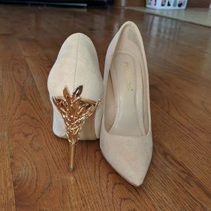 Blush and gold heels.